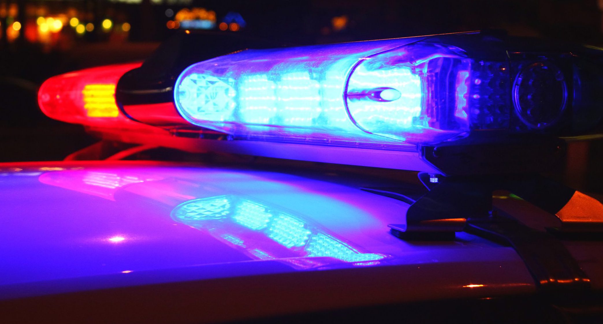 Police car lights night file photo